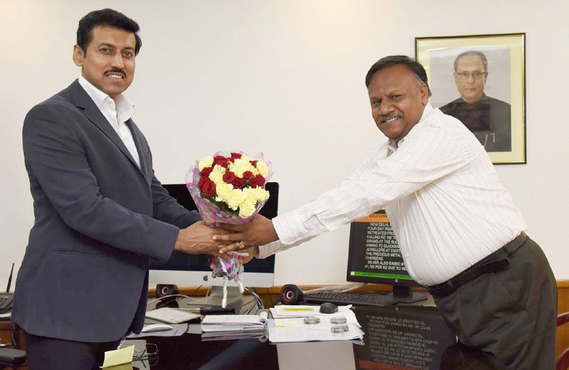 The Minister of State for Information & Broadcasting, Col. Rajyavardhan Singh Rathore greets Mr. Ajay Mittal after taking charge as the Secretary, Ministry of Information & Broadcasting, in New Delhi on May 02, 2016.