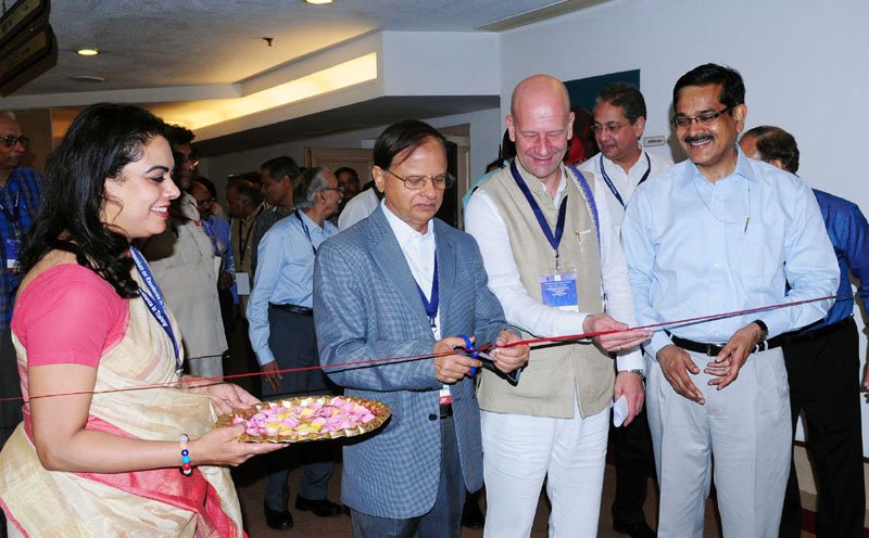 The Additional Principal Secretary to the Prime Minister, Dr. P.K. Mishra inaugurating an exhibition, during the National Symposium on Excellence in Training, in Delhi on May 27, 2016. The Secretary, DoPT, Mr. Sanjay Kothari and other dignitaries are also seen.