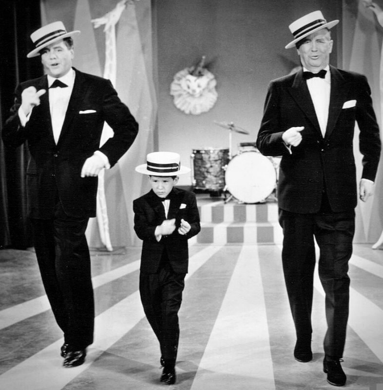 Maurice Chevalier, Desi Arnaz and Desi Arnaz Jr. dancing into oblivion.